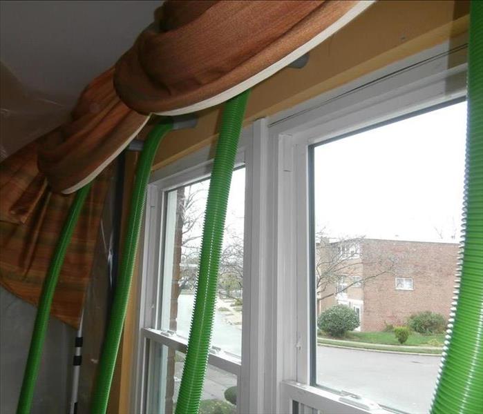 Drying equipment set up to dry the inside of the walls of a Collingdale home