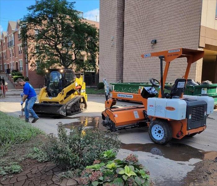 excavation equipment in a parking lot