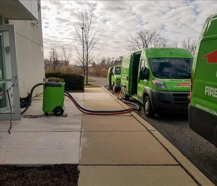 SERVPRO trucks outside of a Delaware County commercial building