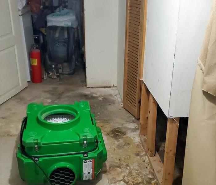Air mover and removed materials from the walls in a Philadelphia home