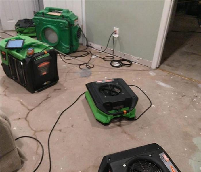 Drying equipment on floor.