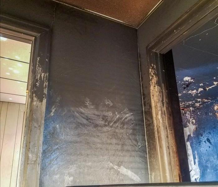 Smoke and soot damage on the ceiling of a Collingdale home.