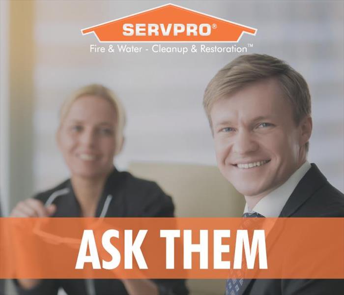 Businessman and businesswoman smiling, SERVPRO logo phrase Ask them